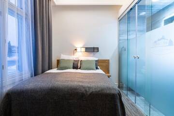 Фото номера Стандартный двухместный номер с 1 кроватью Отель De Gamlas Hem Hotel &amp; Restaurant г. Оулу 4