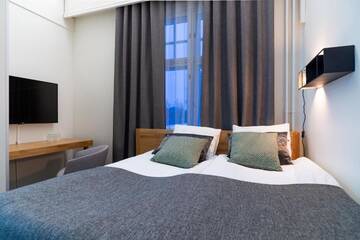 Фото номера Стандартный двухместный номер с 1 кроватью Отель De Gamlas Hem Hotel &amp; Restaurant г. Оулу 8