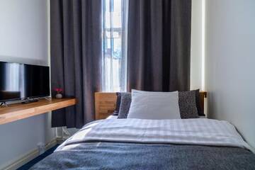 Фото номера Стандартный одноместный номер Отель De Gamlas Hem Hotel &amp; Restaurant г. Оулу 3