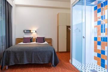 Фото номера Стандартный номер с кроватью размера &quot;queen-size&quot; Отель De Gamlas Hem Hotel &amp; Restaurant г. Оулу 5